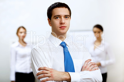 Young businessman at work in office