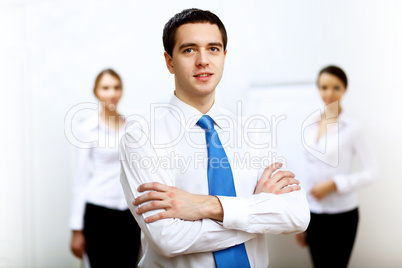 Young businessman at work in office