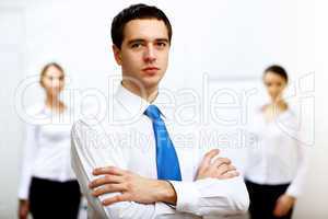 Young businessman at work in office