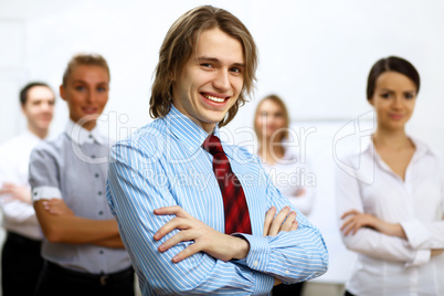 Young businessman at work in office