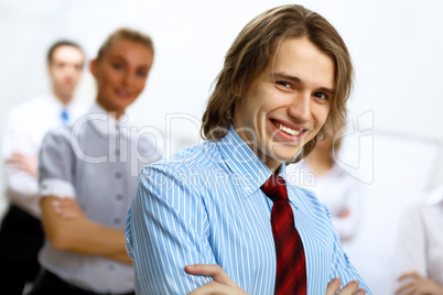 Young businessman at work in office