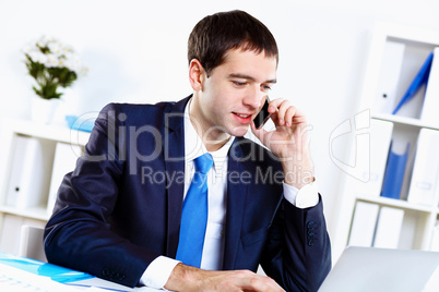 Young businessman in office