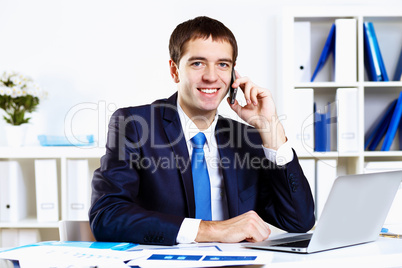 Young businessman in office