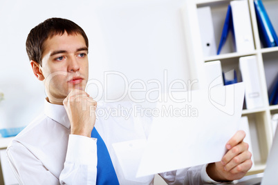 Young businessman in office