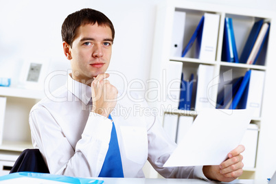 Young businessman in office