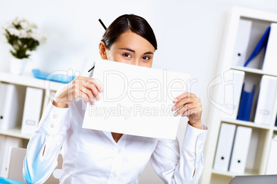 Young woman in business wear in office