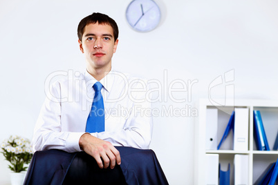 Young businessman in office