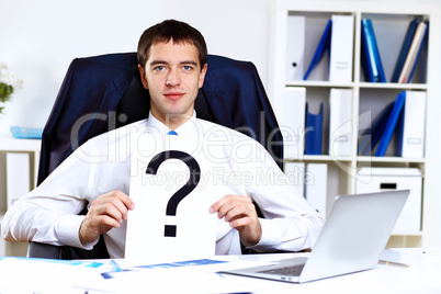 Young businessman in office