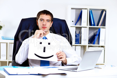 Young businessman in office