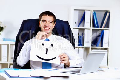 Young businessman in office