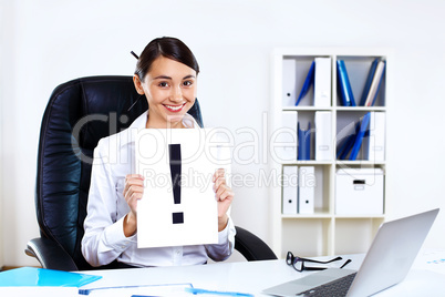 Young woman in business wear in office