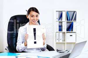 Young woman in business wear in office