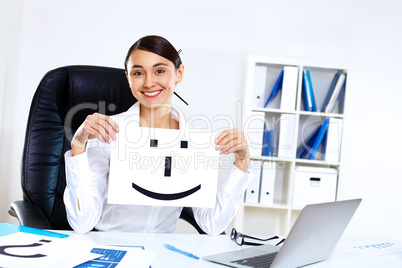 Young woman in business wear in office Young woman in business wear in office