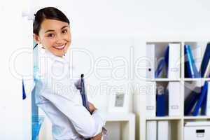 Young woman in business wear in office