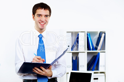 Young businessman in office