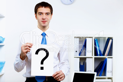 Young businessman in office