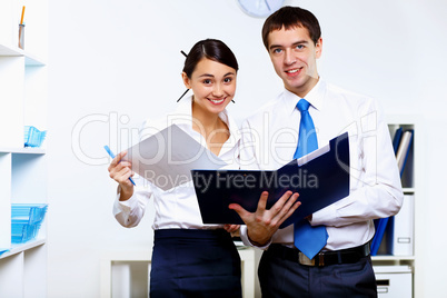 Two young business collegue in office