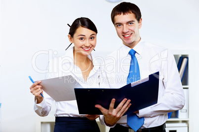 Two young business collegue in office