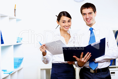 Two young business collegue in office