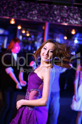 Young woman having fun at nightclub disco Young woman having fun at nightclub disco