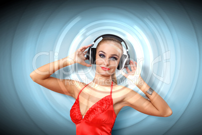 Young woman in evening dress with headphones