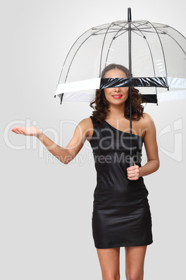 Woman in black dress with umbrella