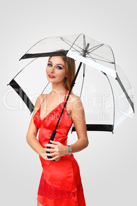 Woman in black dress with umbrella
