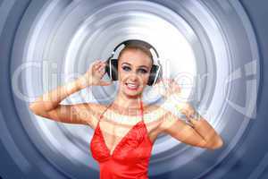 Young woman in evening dress with headphones