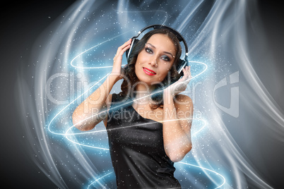 Young woman in evening dress with headphones