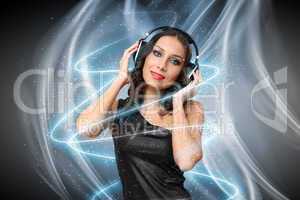 Young woman in evening dress with headphones