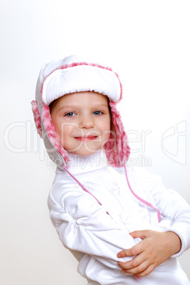 Kid in winter wear against white background