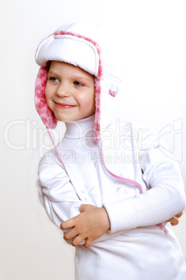 Kid in winter wear against white background