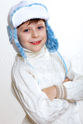 Kid in winter wear against white background