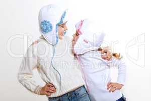 Kid in winter wear against white background