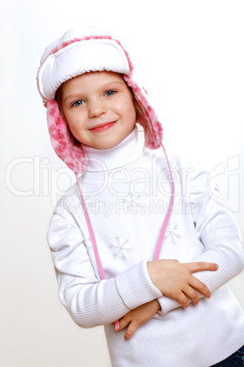 Kid in winter wear against white background