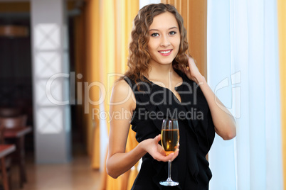 Young pretty woman sitting in restaurant