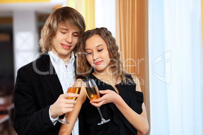 Couple in a restaurant with shampagne