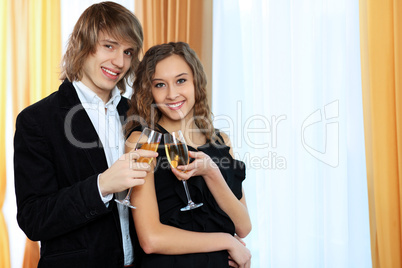 Couple in a restaurant with shampagne