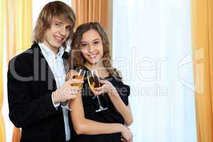 Couple in a restaurant with shampagne