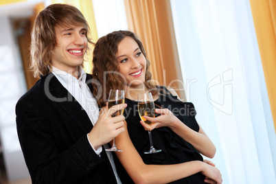 Couple in a restaurant with shampagne