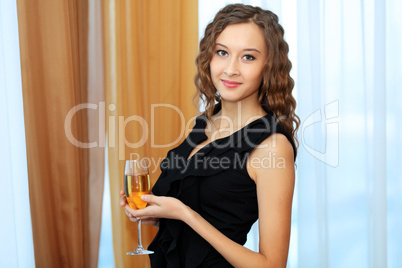 Young pretty woman sitting in restaurant