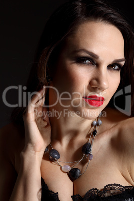 Studio portrait of young beautiful woman