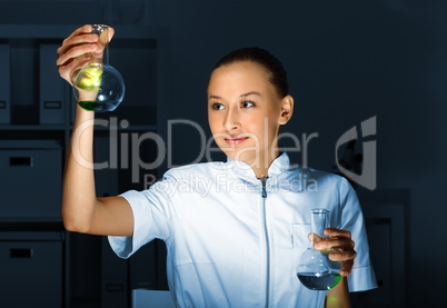 Young chemist working in laboratory