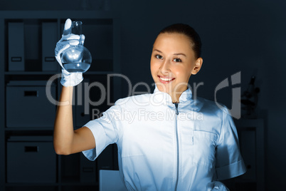 Young chemist working in laboratory