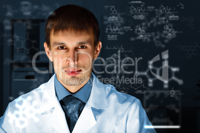 Young chemist working in laboratory