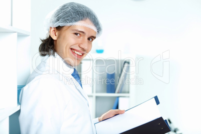 Young doctor in white uniform