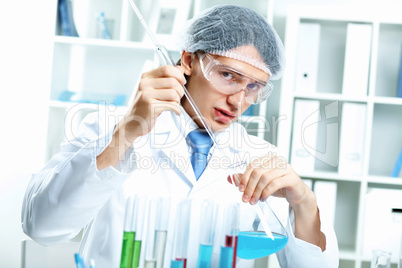 Young scientist working in laboratory