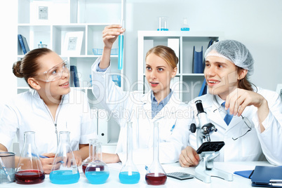 Young scientists working in laboratory