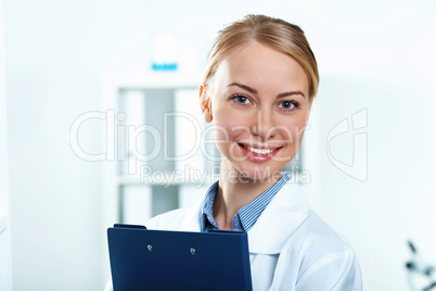 Young doctor in white uniform