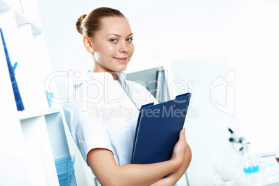 Young doctor in white uniform